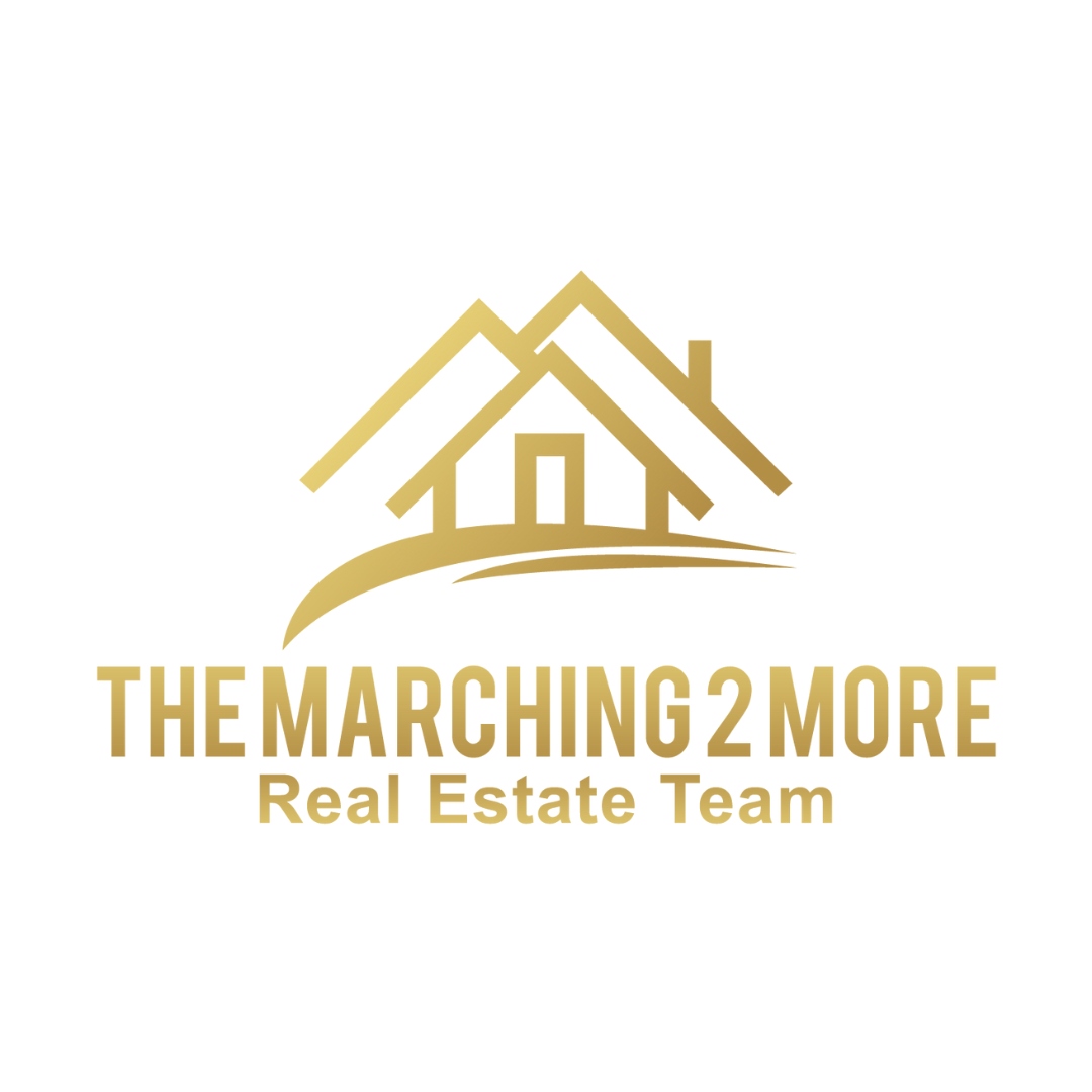 The Marching 2 More Real Estate Team